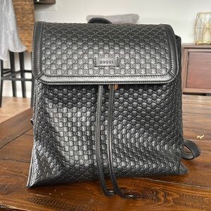 NEW 100% AUTHENTIC GUCCI BLACK LEATHER GG MONOGRAM DRAWSTRING BACKPACK